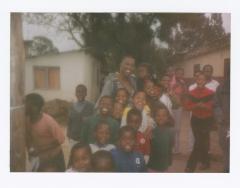 Kim Briscoe Moody with South African children