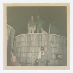 VITA Foods employees pose by tank