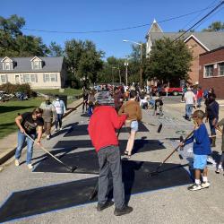 Painting the Black Lives Matter street mural on North College Avenue