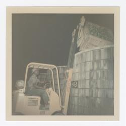 Robert Moore operating a forklift at night