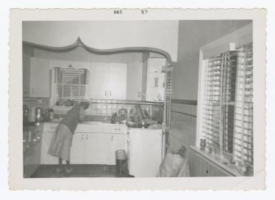 A woman washing dishes