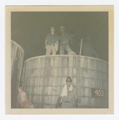 VITA Foods employees pose by tank