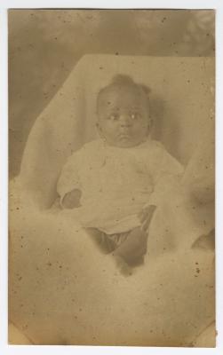 A baby in a white bundle