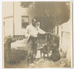 Charlie Hines with dogs Billie, Gunner, and Danny