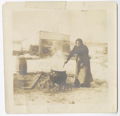 Aunt Mary Comas, making lard
