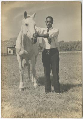 African American man with a horse