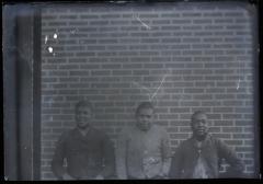 Three unidentified young African American men at the Kent County Jail