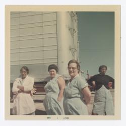 Female VITA Foods employees posing outside
