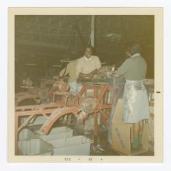 Doris Green and Geraldine Brooks at the VITA Foods fish processing machine
