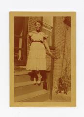 Woman standing on porch