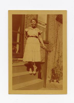 Woman standing on porch