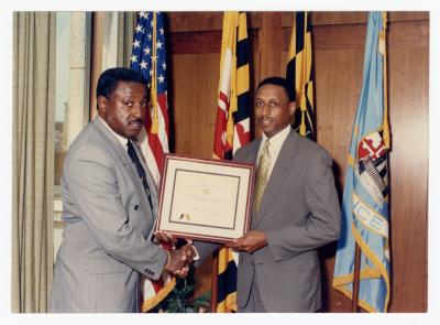 Sam Ringgold Jr. receiving an award for being the Director of Public Relations at Baltimore City Department 