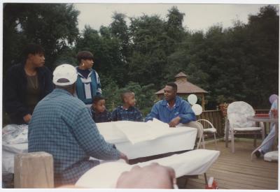 Darius Johnson and family in Big Woods, 1995