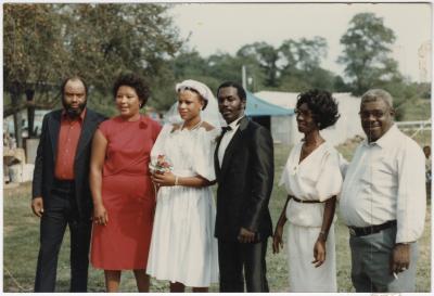 Deborah and Barry Jones with parents on wedding day, 1983