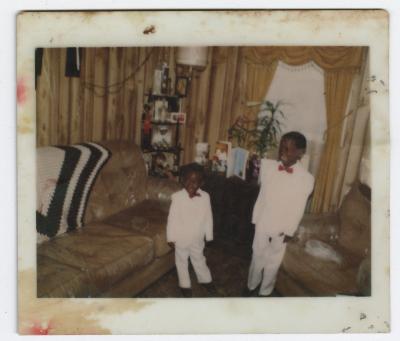 Jawan and Lamonte Harris in tuxedoes 