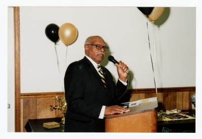 Sam Ringgold Sr. giving a speech at his 80th birthday