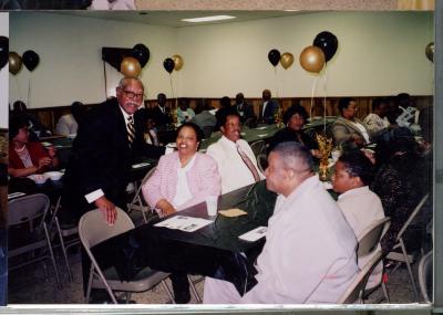 Sam Ringgold Sr. with guests at his 80th birthday celebration