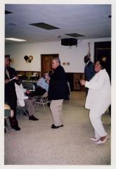 Guests dance at Sam Ringgold Sr.'s 80 birthday celebration
