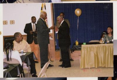 Sam Ringgold Sr. accepting a gift at his 80th birthday celebration